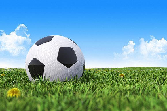 Soccer Ball On A Green Grass Field