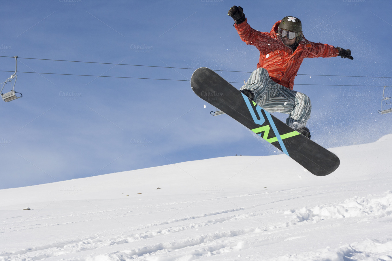 Snowboarder's jump ~ Sports Photos on Creative Market