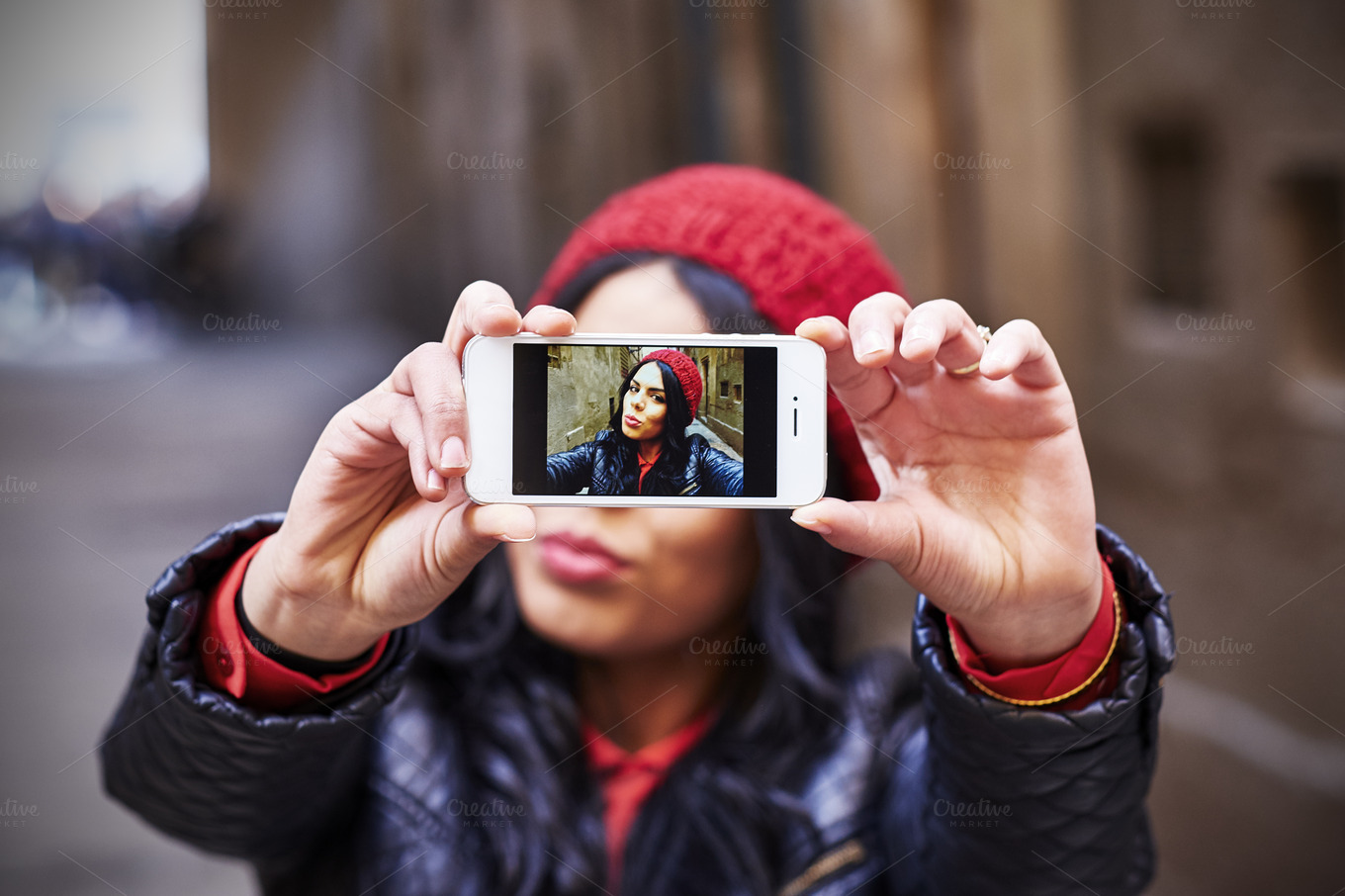 Young girl taking a selfie  People Photos on Creative Market