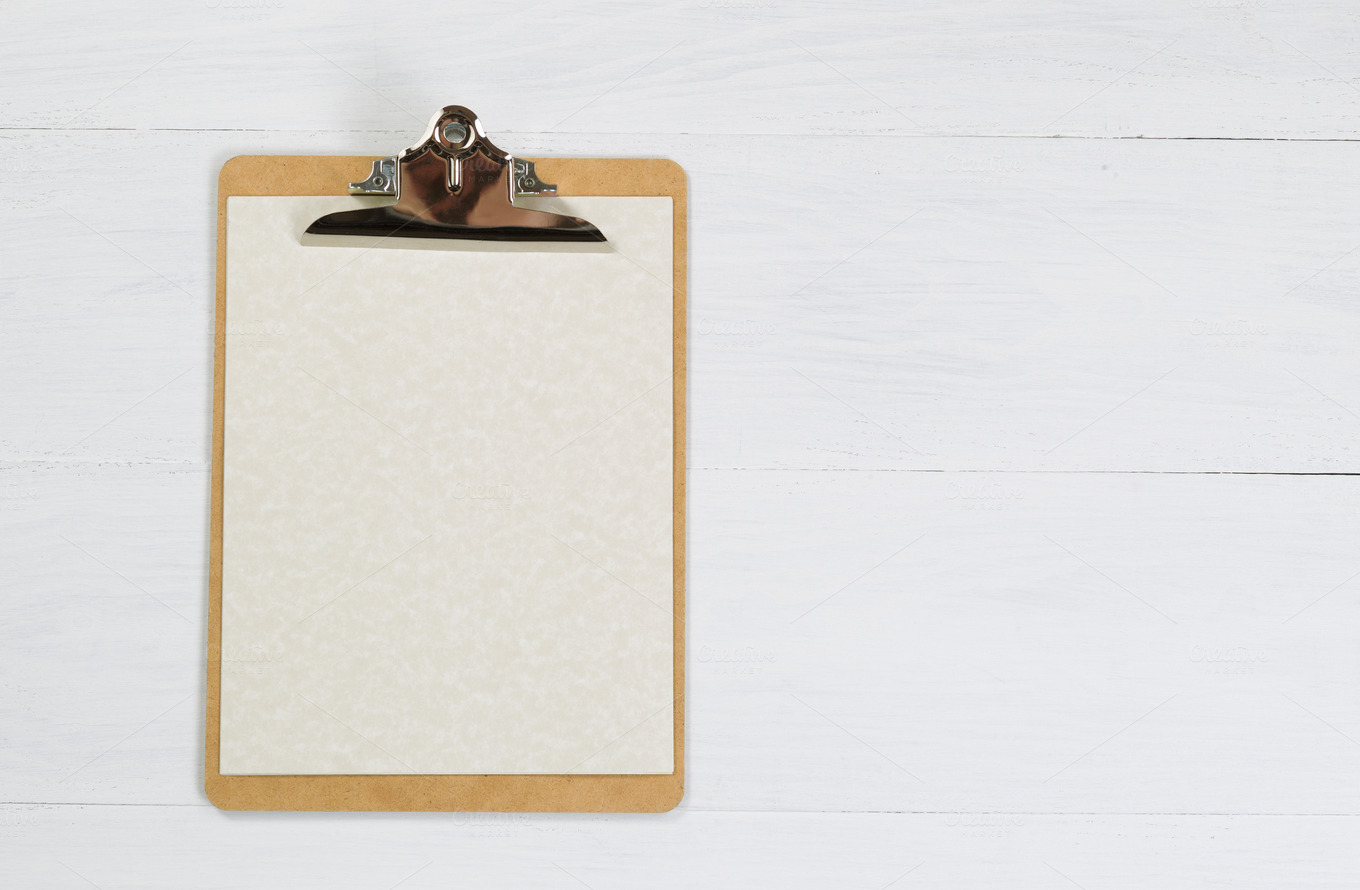 Clipboard on white desktop ~ Business Photos on Creative Market