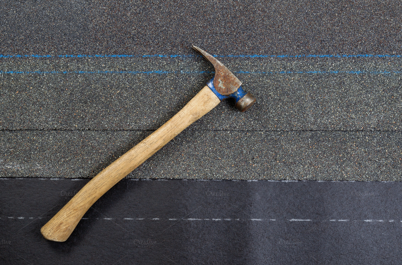 roofing hammer on composite shake Industrial Photos on Creative Market