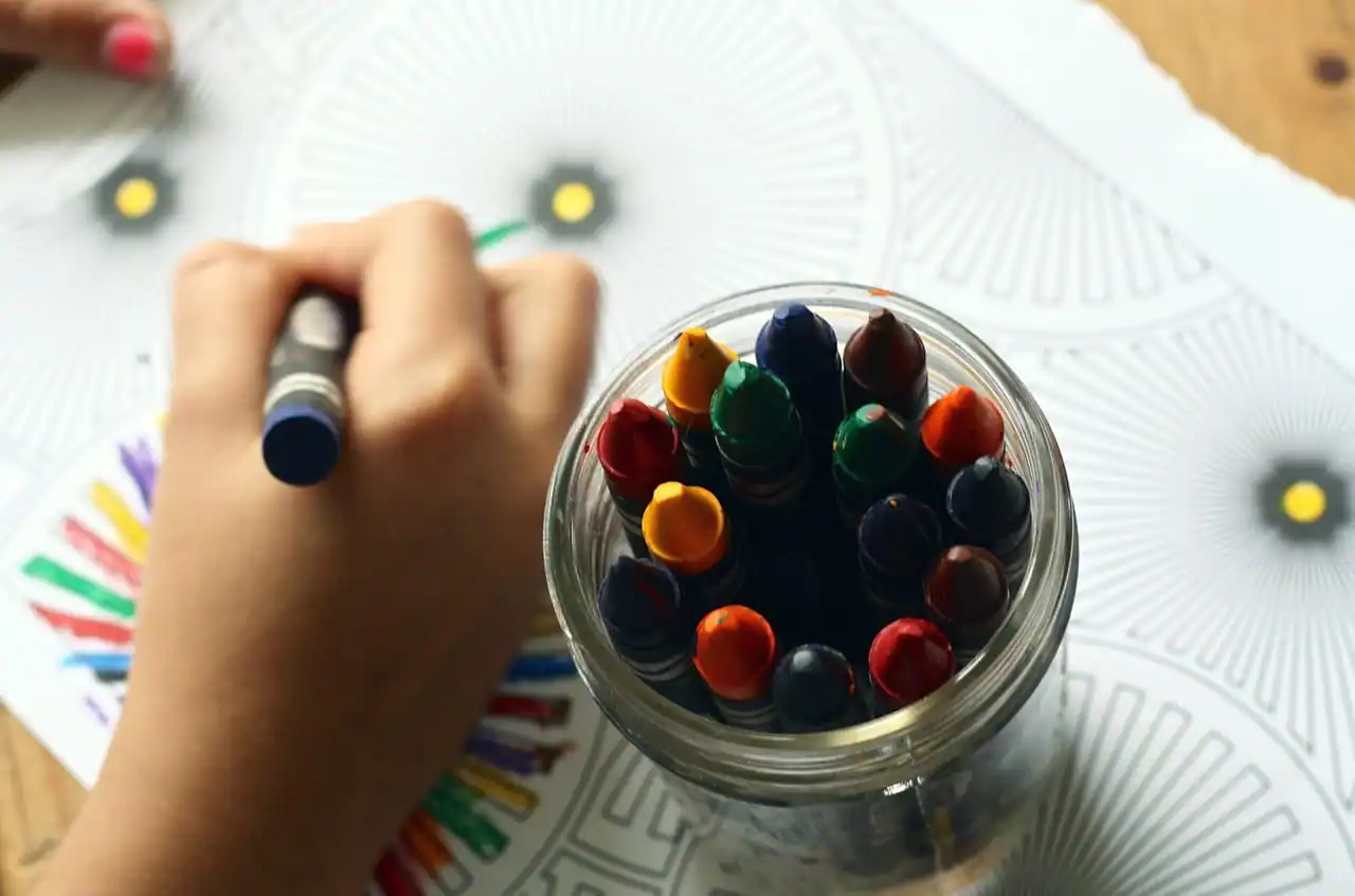 crayons on the drawing table